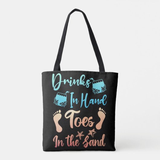 Drink in handspeelgoed in het zand - strand Gezegd Tote Bag (Achterkant)