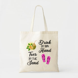 Drink in mijn hand, tenen in het zand tote bag