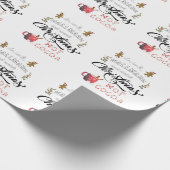 Drink warme cacao en kijk naar de kerst cadeaupapier (Hoek)