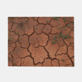 Droge, gebarsten grond deurmat (Voorkant)