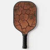 Droge, gebarsten grond pickleball paddle (Achterkant)