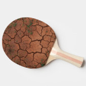 Droge, gebarsten grond tafeltennisbatje (Zijkant)