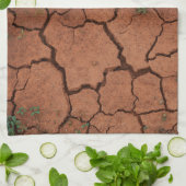 Droge, gebarsten grond theedoek (Gevouwen)