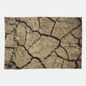 Droge grond met gekraakte aarde in droogte theedoek (Horizontaal)