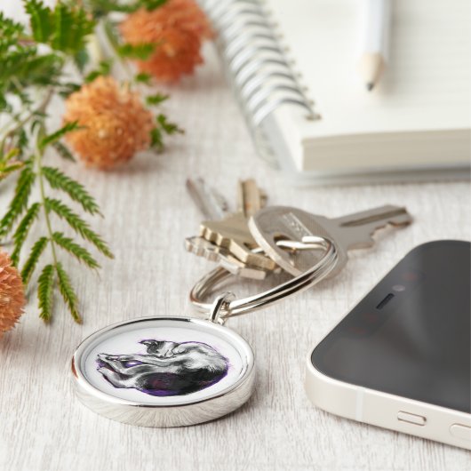 Dromende kat. sleutelhanger (Zijkant)