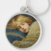 Dromerig slapend kind in bloemenquilt sleutelhanger (Voorkant)