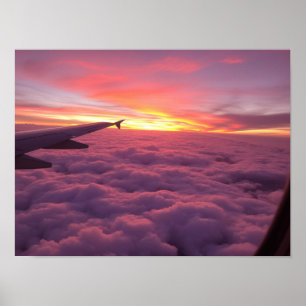 Dromerige roze en paarse zonsondergangswolken vanu poster