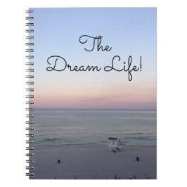Droomleven met zonsopgang op het strand notitieboek
