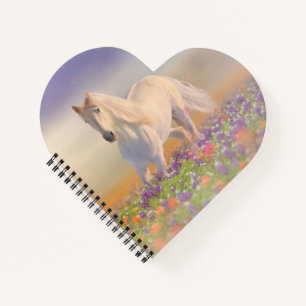 Droompaard loopt door bloemen notitieboek
