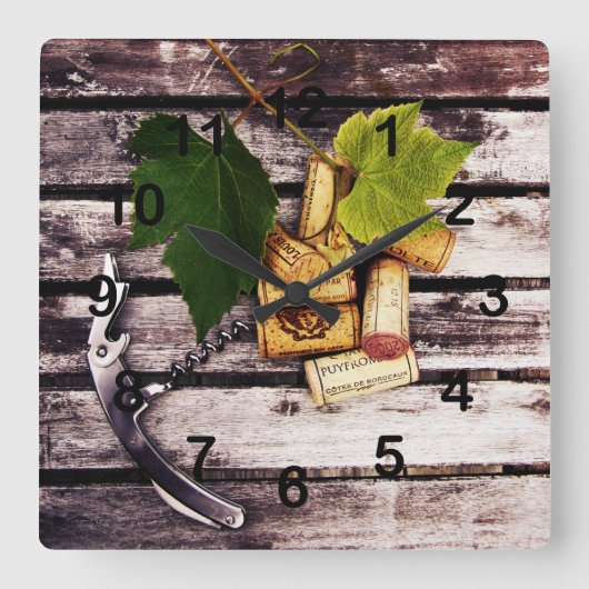 Druivenblad, kurken van wijnflessen en kurkentrekk vierkante klok (Voorkant)