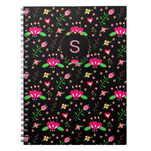 Druk bloempatroon op zwarte monogram notitieboek (Voorkant)