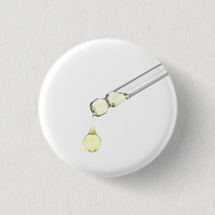 Druppelend geel serum uit een pipet ronde button 3,2 cm