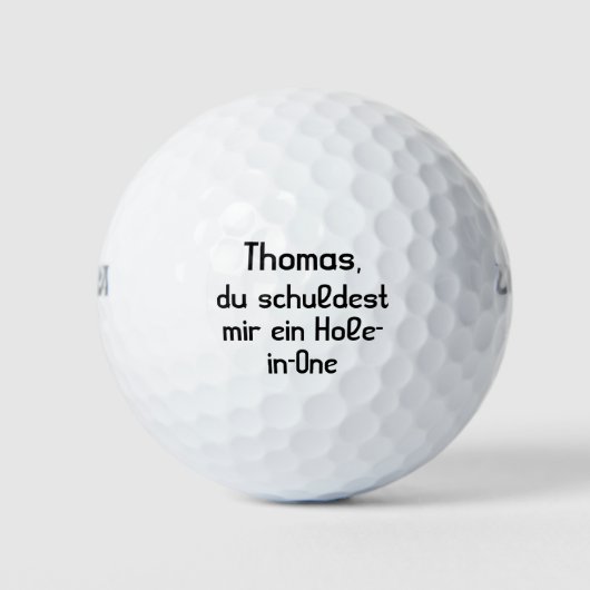 Du schuldest mir ein Hole-in-One Golfballen (Voorkant)