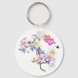 Dubbel monogram gevlochten harten met bloemen sleutelhanger