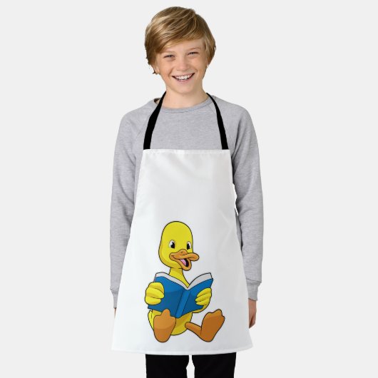 Duck bij Lezen met Boek Schort (Gedragen)