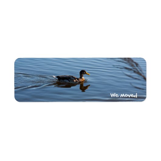 Duck dat we etiketten hebben verplaatst (Voorkant)