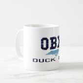 Duck. Mok (Voorkant links)