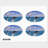 Duistere dolfijnen aan het spelen ovale sticker (Vel)