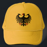 Duitse adelaar trucker pet<br><div class="desc">Dit Duitse adelmodel van Richard H. Fay smelt de moderne en middeleeuwse. Het was geïnspireerd door zowel de moderne federale adelaar als de verschillende middeleeuwse kruidachtige arenden.</div>