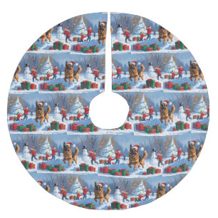 Duitse herder die in de sneeuw rent met kerstmuts kerstboom rok