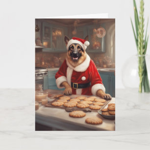 Duitse herder in kerstmannenpak die koekjes bakt kaart