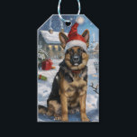 Duitse herder Winter Wonderland Christmas Joy Cadeaulabel<br><div class="desc">Dit feestelijke ontwerp vangt de vrolijke sfeer van het vakantieseizoen, met een schattige pup die een kerstmuts draagt. De hond is genesteld in een winterwonderland, compleet met een sneeuwpop, een versierde kerstboom en prachtig ingepakte cadeaus. Sneeuwvlokken herfsten zachtjes en voegen een magische toets toe aan het tafereel, terwijl de levendige...</div>