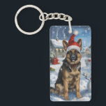 Duitse herder Winter Wonderland Christmas Joy Sleutelhanger<br><div class="desc">Dit feestelijke ontwerp vangt de vrolijke sfeer van het vakantieseizoen, met een schattige pup die een kerstmuts draagt. De hond is genesteld in een winterwonderland, compleet met een sneeuwpop, een versierde kerstboom en prachtig ingepakte cadeaus. Sneeuwvlokken herfsten zachtjes en voegen een magische toets toe aan het tafereel, terwijl de levendige...</div>