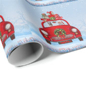 Duitse herderhond in auto met kerstman cadeaupapier (Rol Hoek)