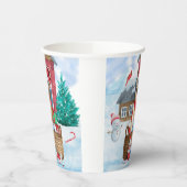 Duitse herderhond in het sneeuwkersthondenhuis papieren bekers (Links)