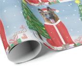 Duitse herderhond met kerstcadeaus in sneeuw cadeaupapier (Rol Hoek)