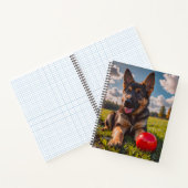 Duitse Herdershond Puppy met een Speelgoed Notitieboek (Binnen)