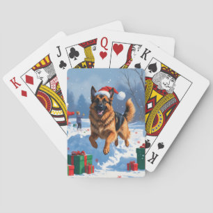 Duitse Herdershond Rent in de Sneeuw met Kerstmuts Pokerkaarten