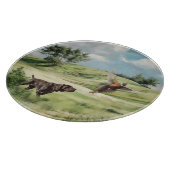 Duitse kortharige pointer die naar een fazant wijs snijplank (Hoek)