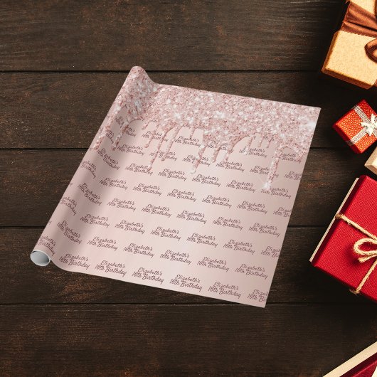 Duizelig roos gouden glitterdrift op 16-jarige ver cadeaupapier
