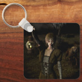 Dunne vrouw die lamp draagt sleutelhanger (Voorkant)
