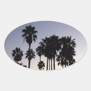 Dusk met Palm Trees Tropische Scene Ovale Sticker