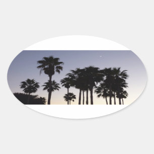 Dusk met Palm Trees Tropische Scene Ovale Sticker