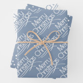 Dustblauw kersttypografie en stippen vakantie inpakpapier vel (In situ)