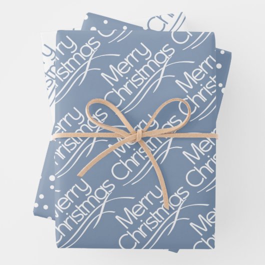 Dustblauw kersttypografie en stippen vakantie inpakpapier vel (In situ)