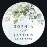 Dusty Blue Eucalyptus Greenery Succulent Wedding Ronde Sticker<br><div class="desc">Dit ontwerp is beschikbaar met twee verschillende stoffige blauwe tinten. Eén optie is veel duurder dan de andere en leidt naar een grijs-stoffige blauw. Deze die u momenteel bekijkt leunt meer naar blauw voor de waterverf spetters. Vergelijk elke voorvertoning op het scherm voor een perfecte overeenkomst wanneer het op uw...</div>