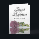 Dusty Mauve Roos Elegant Romantic Photo Wedding<br><div class="desc">Deze prachtige huwelijksuitnodigingen zijn voorzien van een verbluffend design met een enkel roos met lange steentjes of een roze, roze roos dat reflecteert in water met golven en rimpels. De voorzijde toont de eerste namen van het paar in fancy manuscript het schrijven. Binnen is ruimte voor de foto van het...</div>