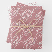 Dusty roos kersttypografie en stippen vakantie inpakpapier vel (In situ)