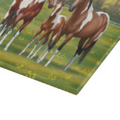 Dwarsboompaarden van de baai in het zomerdeeg snijplank (Hoek)