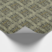 E - monogram in reliëfdruk (goud) cadeaupapier (Hoek)