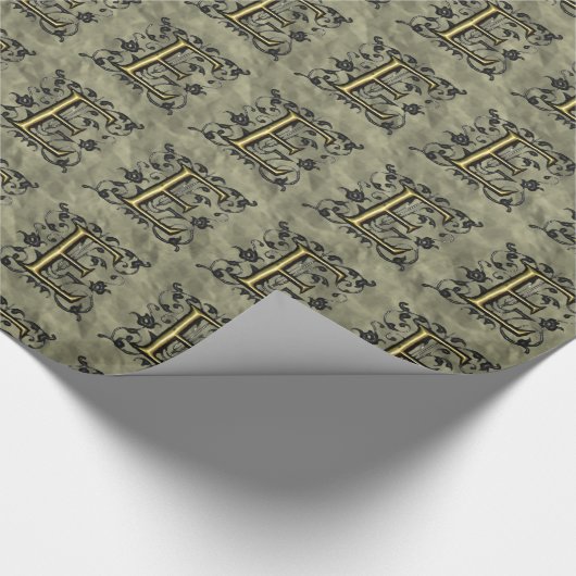 E - monogram in reliëfdruk (goud) cadeaupapier (Hoek)