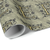 E - monogram in reliëfdruk (goud) cadeaupapier (Rol Hoek)