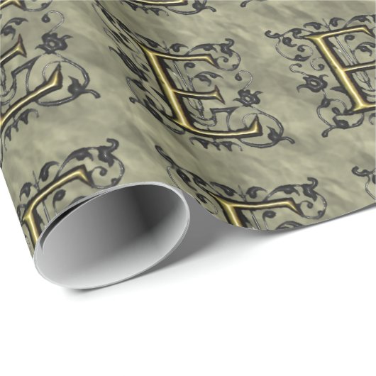 E - monogram in reliëfdruk (goud) cadeaupapier (Rol Hoek)