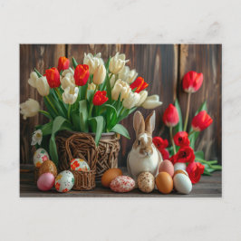 Easter bunny seated beside colorful eggs and tulip briefkaart