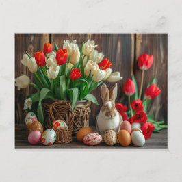 Easter bunny seated beside colorful eggs and tulip briefkaart