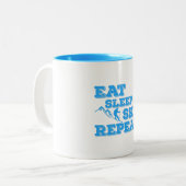 Eat Sleep Ski Herhalen Tweekleurige Koffiemok (Voorkant links)